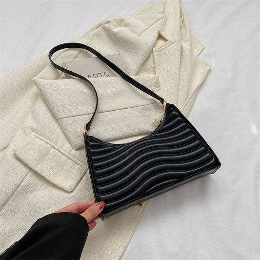 "Elegant Black Wave-Textured Shoulder Bag - Chic & Modern Design"