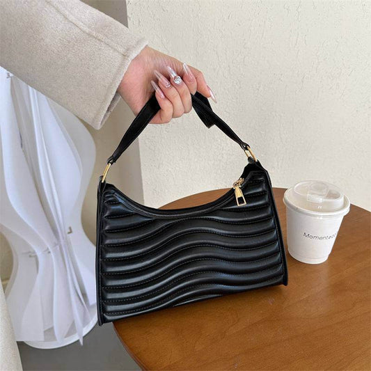"Elegant Black Wave-Textured Shoulder Bag - Chic & Modern Design"